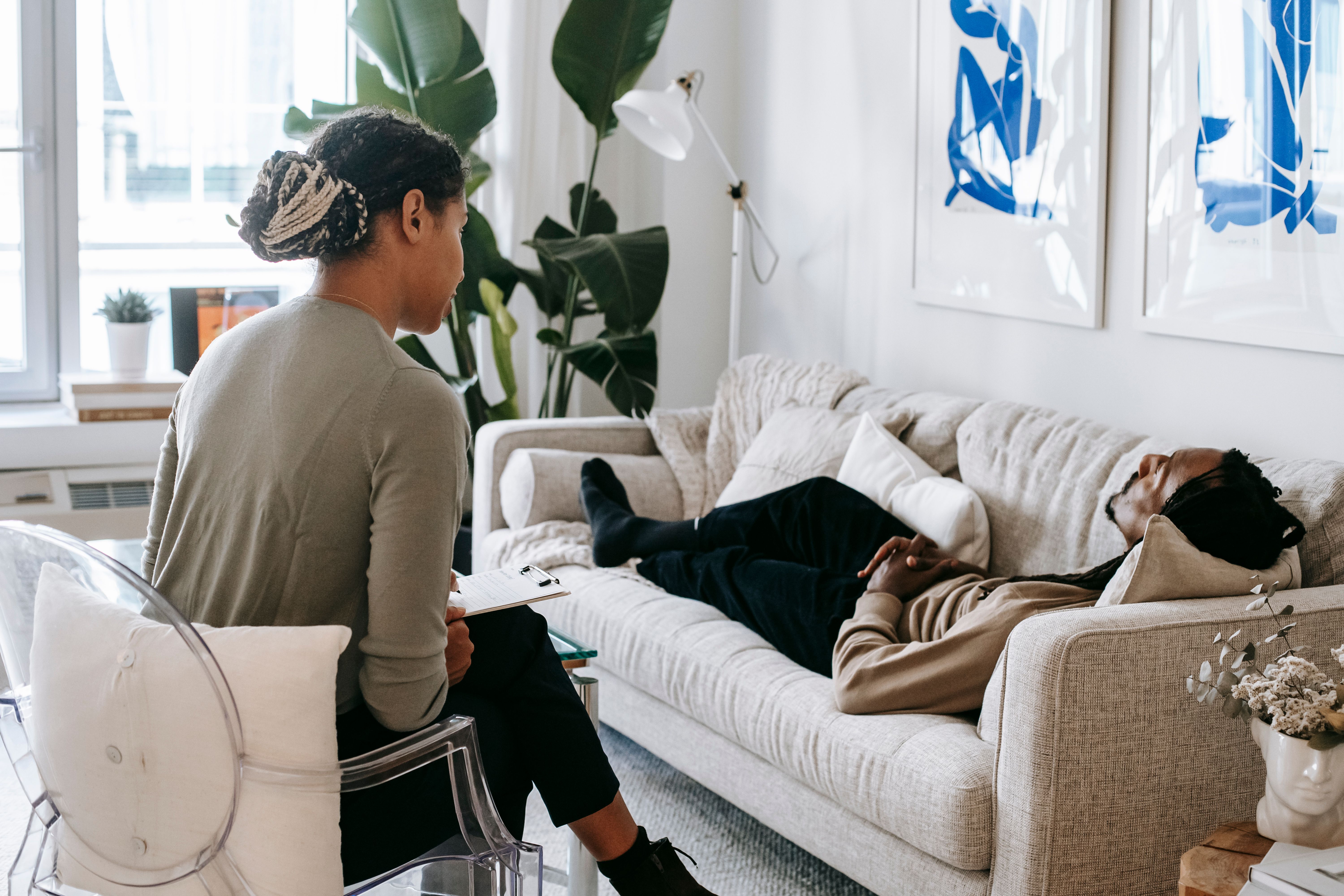 A person resting quietly in soft, warm light — depression and mood support.